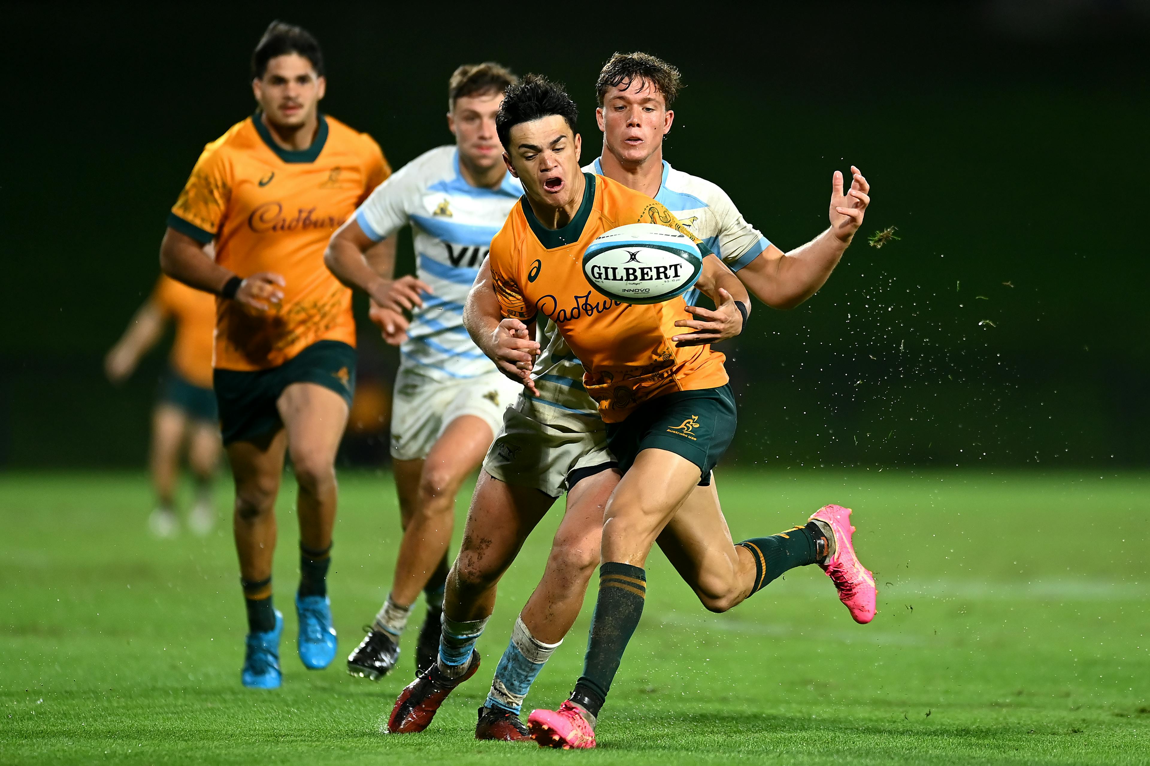 Shane Wilcox is tackled during Australia's opening TRC U20 clash against Argentina. Picture: Getty