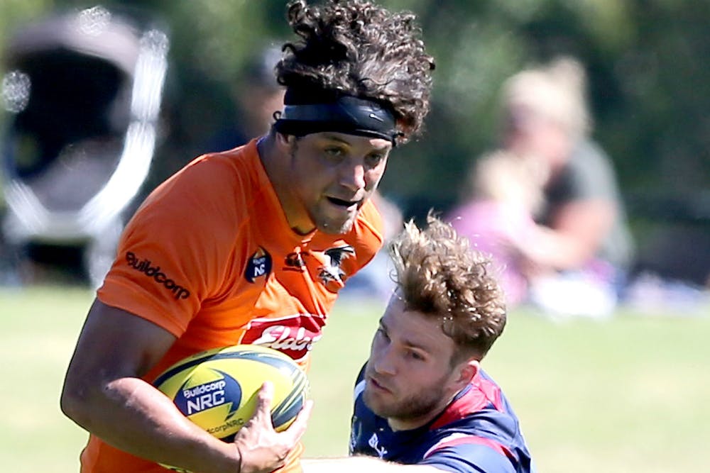 Figg pushes away from Melbourne Rising's Dom Shipperley. Photo: Getty Images