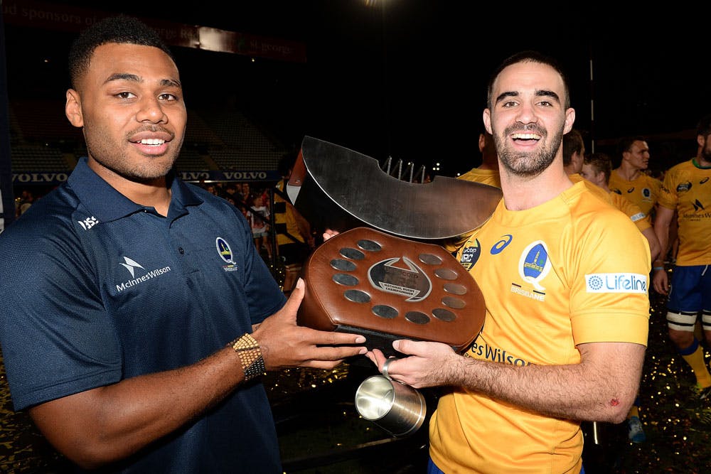 Samu Kerevi and Nick Frisby with the inaugural NRC trophy. Photo: Getty Images