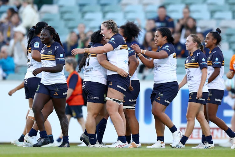 The Brumbies celebrate a tight win over the Rebels. Photo: Getty Images