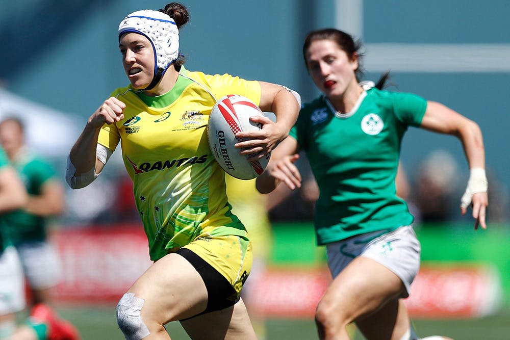 Emillee Cherry strides out on Day One of the World Sevens Series event in Canada. Photo: KLC fotos for World Rugby