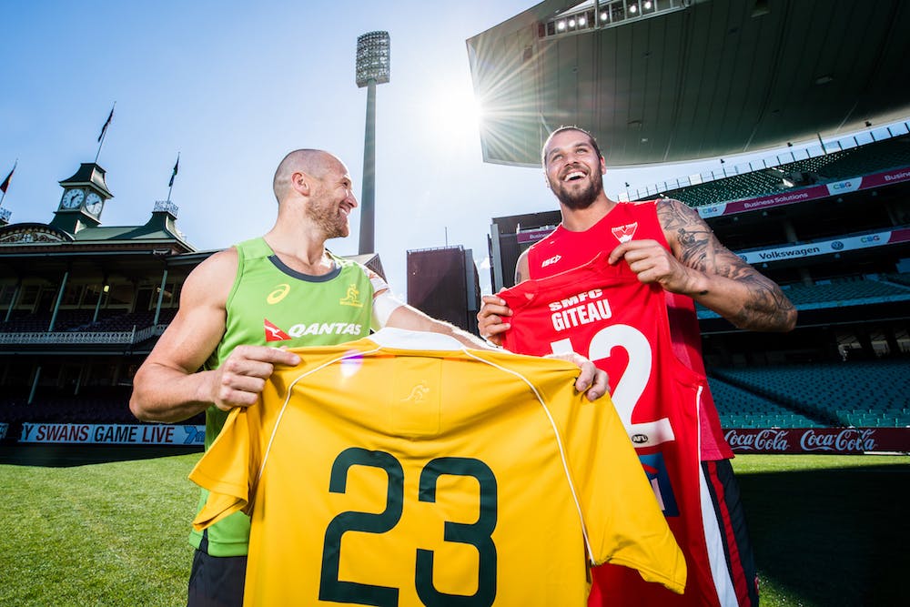 Matt Giteau swaps jerseys on the SCG with brother-in-law and Sydney Swans star Lance Franklin. Photo: ARU Media/Stuart Walmsley