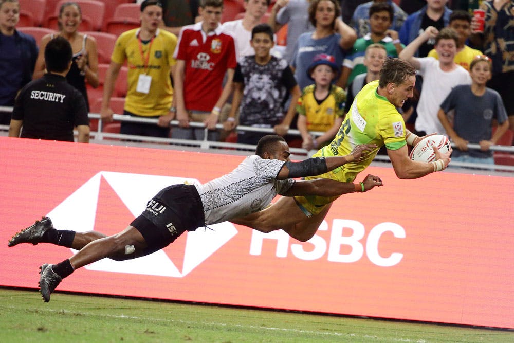 John Porch scores a superb "Superman" try against Fiji in Singapore last year. Photo: Getty Images