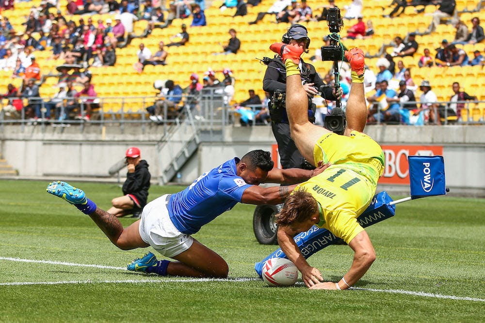 Charlie Taylor dives over Samoan Tomasi Alosio in Wellington. Photo: Getty Images