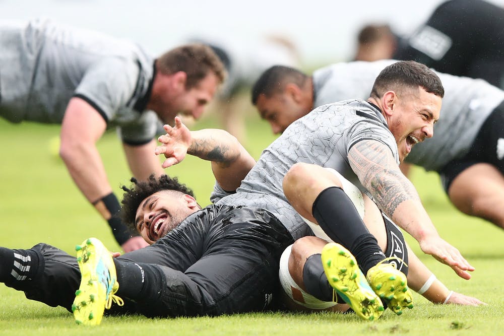 Sonny Bill Williams wrestles with Ardie Savea in Japan. Photo: Getty Images