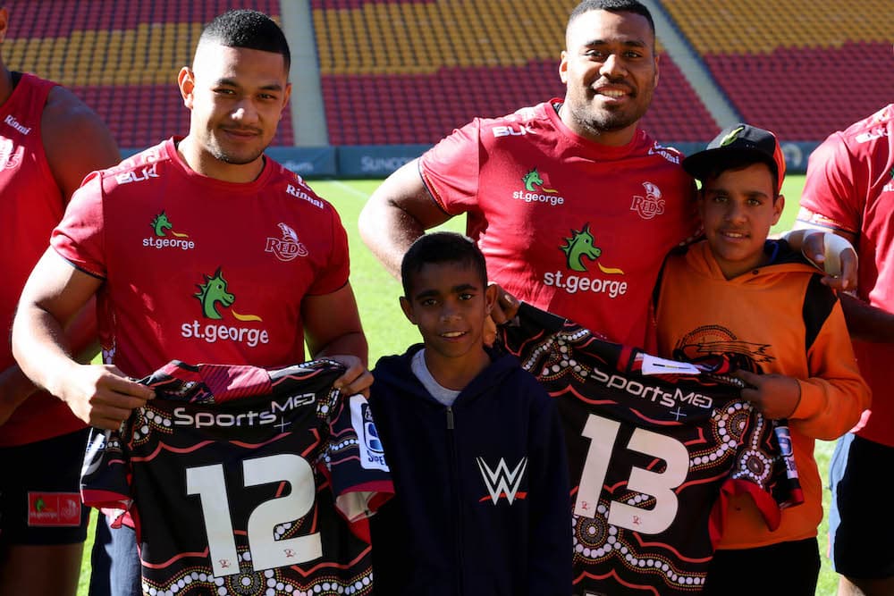 Samu Kerevi and Henry Taefu, celebrating the Reds Indigenous jersey. Photo: QRU Media