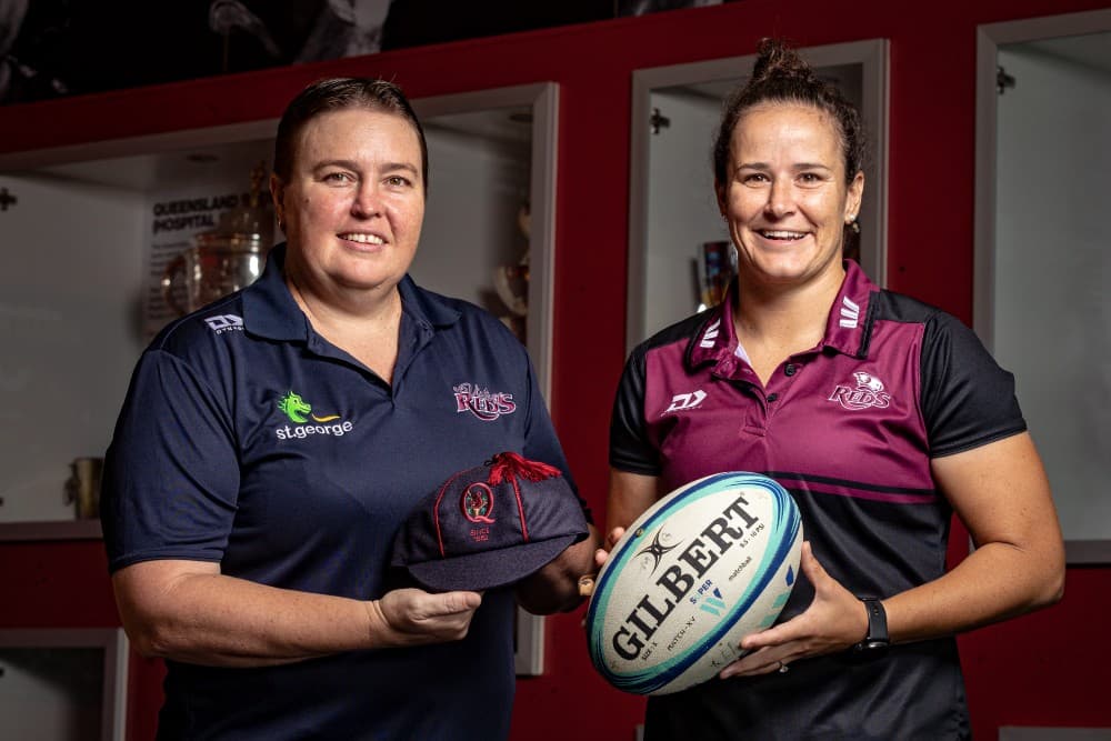 Cap Project researcher Vanessa Bradley with current Queensland captain Shannon Parry. Photo: Brendan Hertel, QRU Media