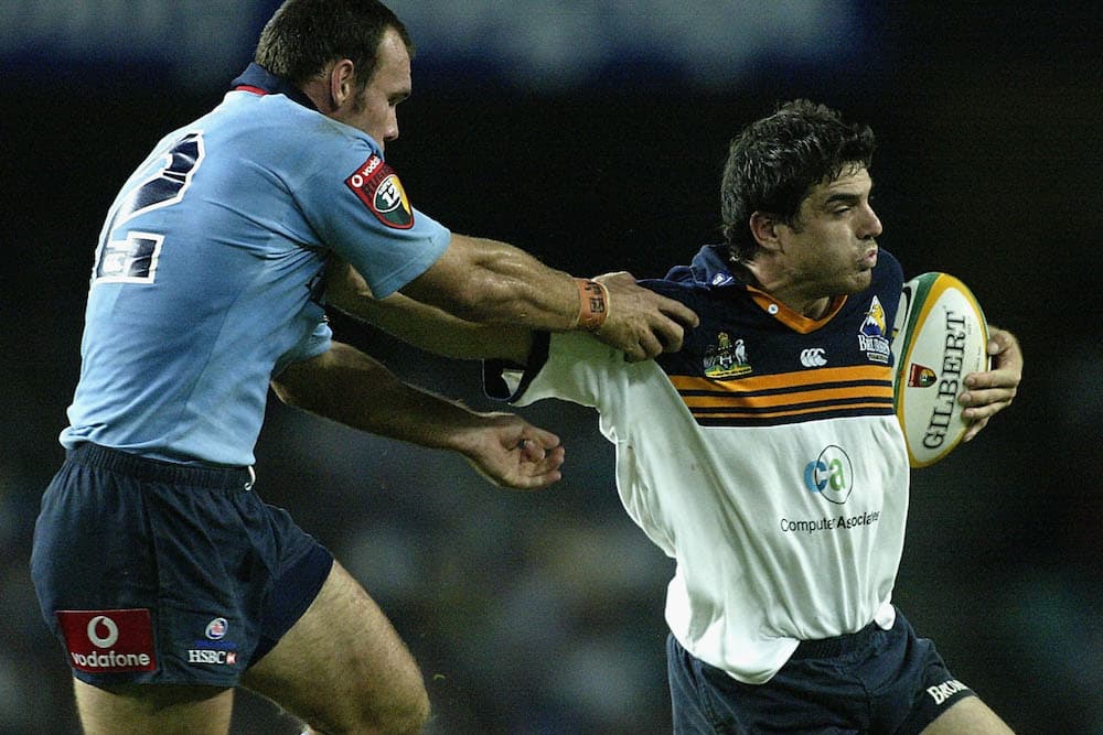 James Holbeck playing against Wallabies Assistant and Waratahs champion, Nathan Grey. Photo: Getty Images