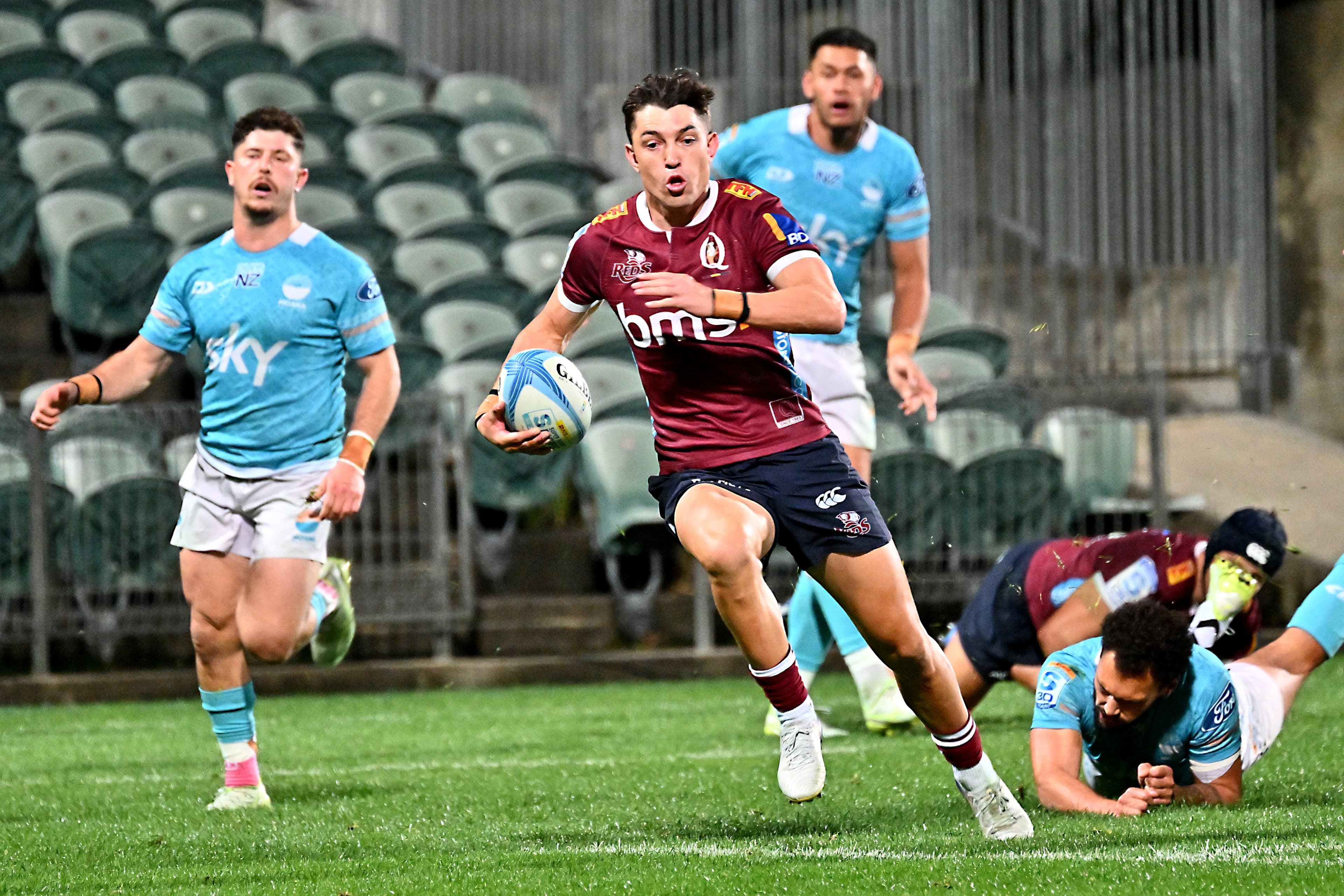 Reds fullback Jock Campbell dashes over for the decisive try against Moana Pasifika in Auckland. Photos: Masanori Udagawa, Getty Images
