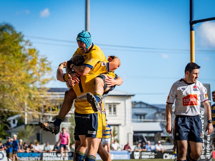 A headgeared Matt Engelbrecht celebrates Bond University's win in the preliminary final
