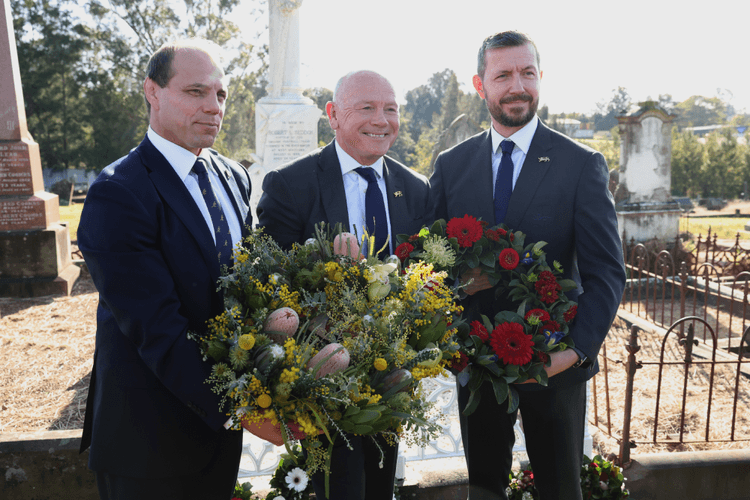 Phil Waugh and Ieuan Evans lay a wreath in honour of the Lions' first captain, Robert Seddon. Source: Getty
