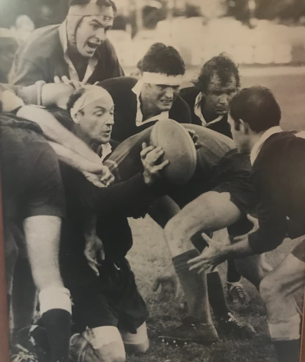 Alec Evans in his playing prime for Queensland pops back possession.