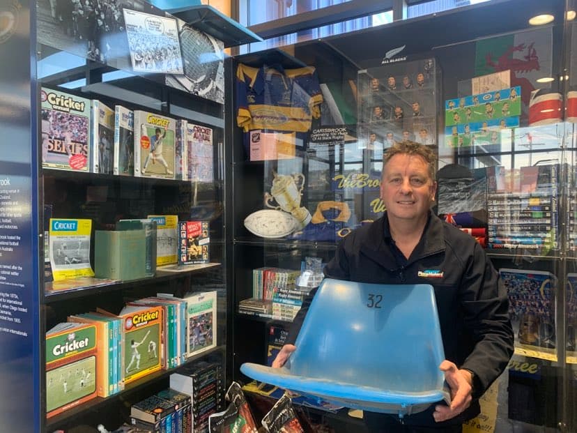 Kiwi building supplies operator Justin Macready with his shrine to the old Carisbrook. Photo Supplied