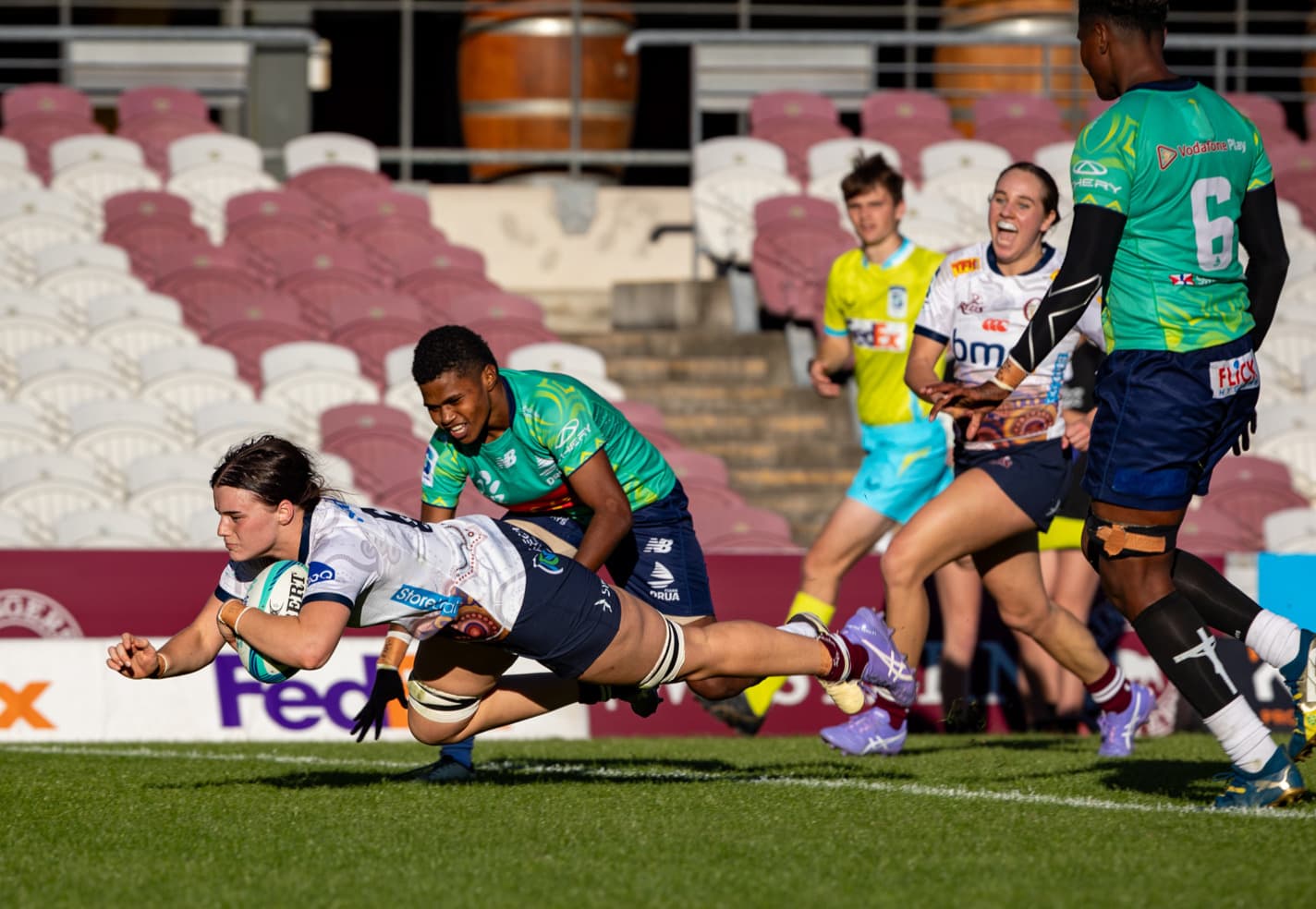 Matchwinner...Reds skipper Jemma Bemrose dives over for the winning try at Ballymore. Photo: Anthony Wingard, Reds Media