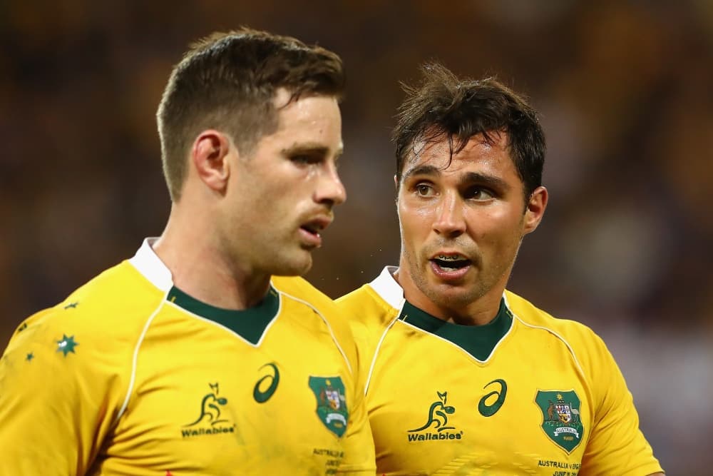 Nick Phipps and Bernard Foley have signed to return with the NSW Waratahs. Photo: Getty Images