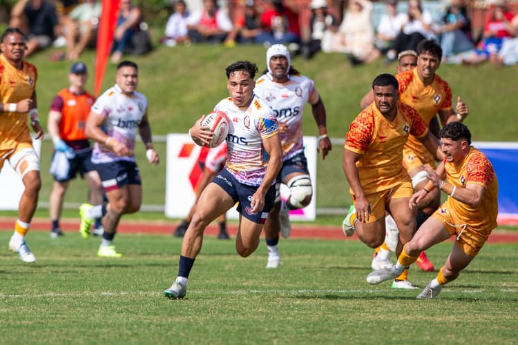 Reds standout Kalani Thomas on the gallop against Tonga in Nuku'alofa