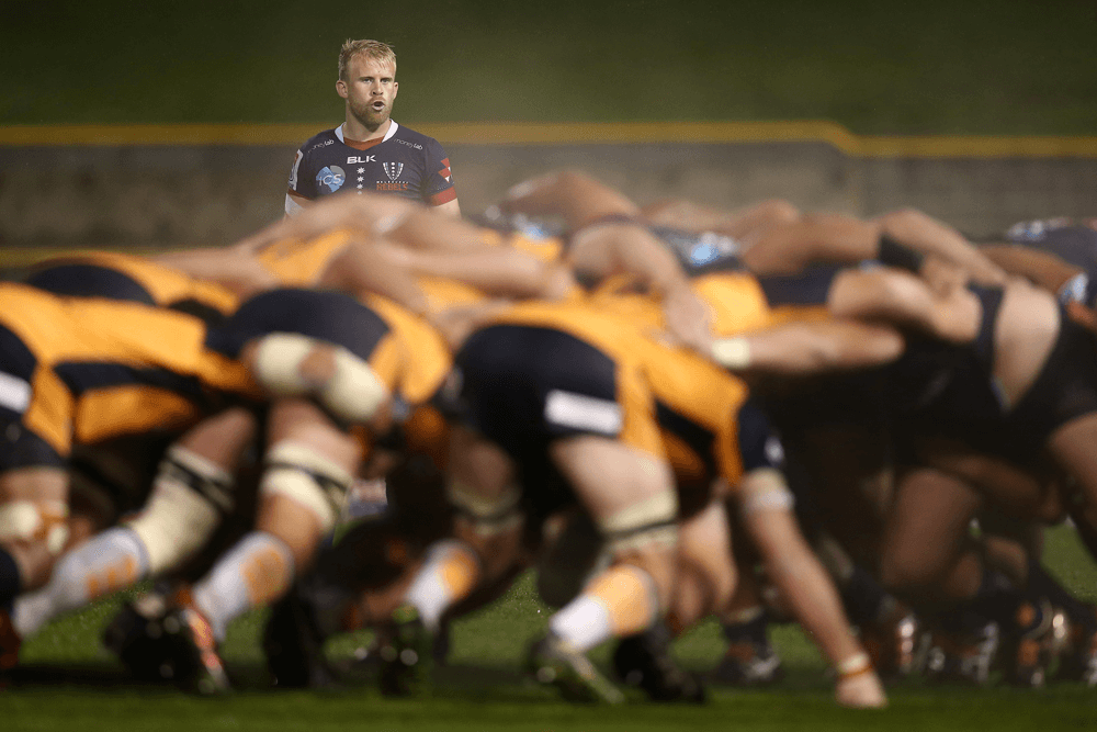 Rebels playmaker Andrew Deegan overseas the Rebels scrum against the Brumbies. Photo: Getty Images