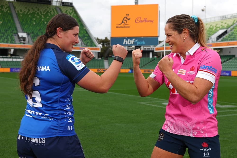 Skippers Sammy Wood and Emily Chancellor share a joking face-off ahead of the Force-Waratahs semi-final. Photo: Getty Images