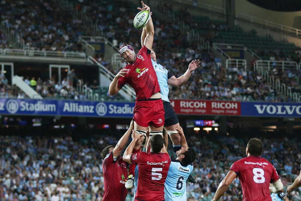Neville in action for the Reds during his time at the Queensland side | Getty Images