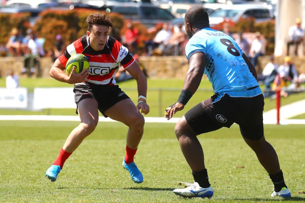 Tom Banks steps his Fijian rival in Canberra's NRC clash against the Drua. Photo: Getty Images 