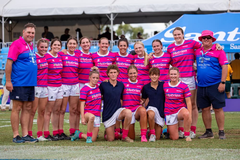 Jack’s Chicks…Georgia Cameron flanked by water boys Ollie Lewington (left) and Lincoln O’Brien and her teammates in Roma.