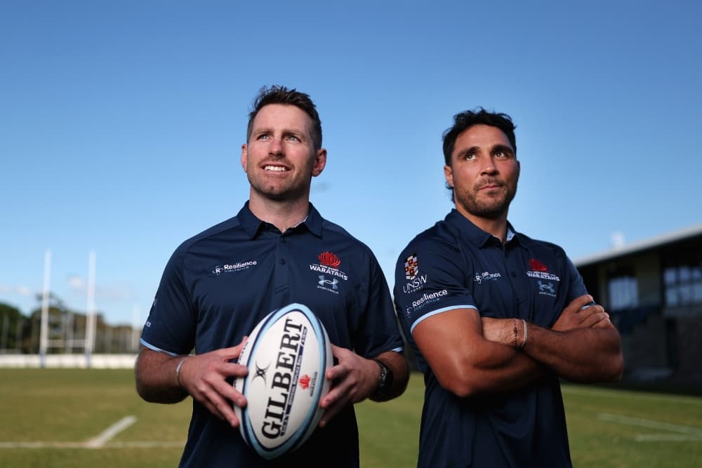 Nick Phipps and Bernard Foley have signed to return with the NSW Waratahs. Photo: Getty Images