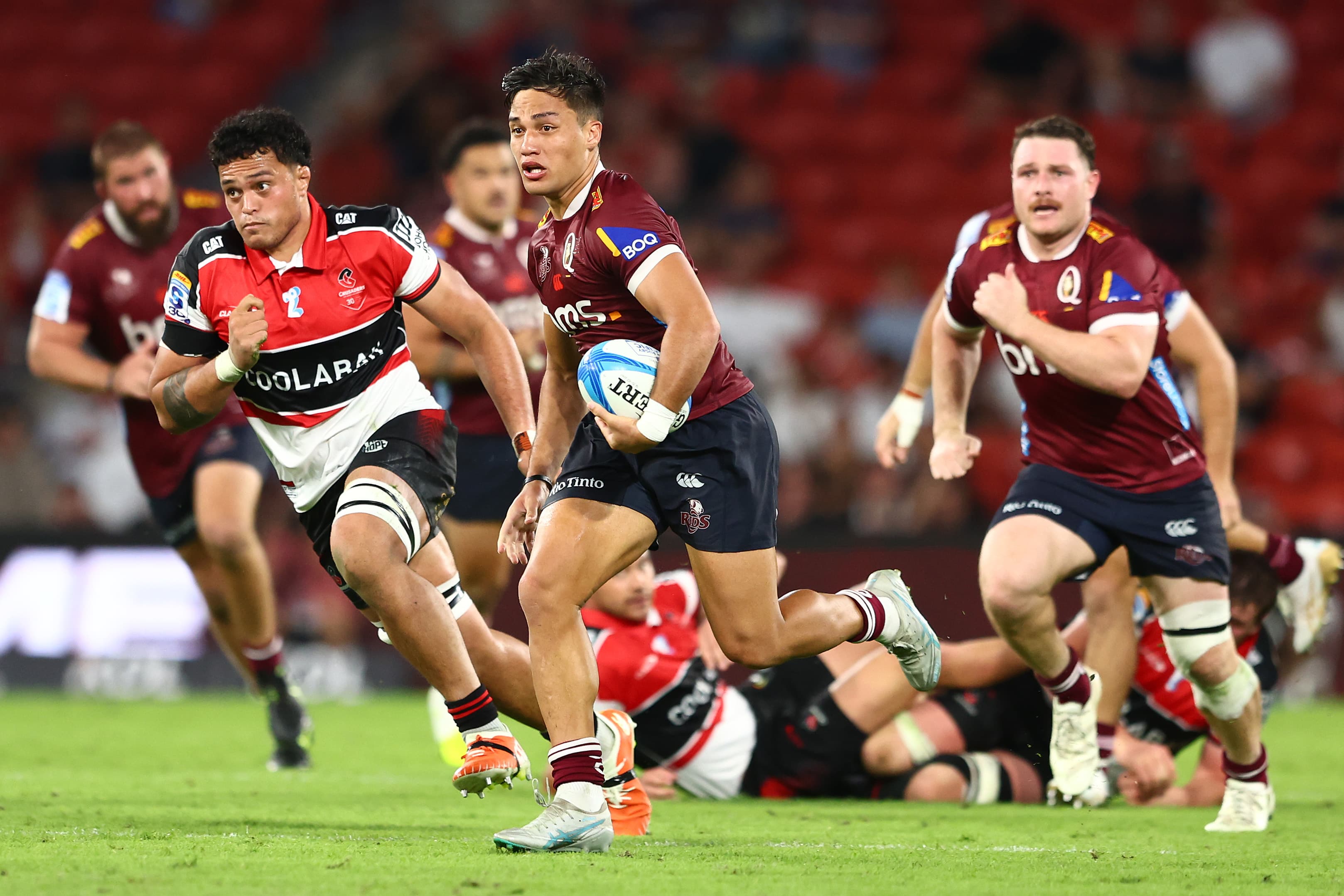 Livewire Reds halfback Kalani Thomas on the charge. Photo: Chris Hyde, Getty Images