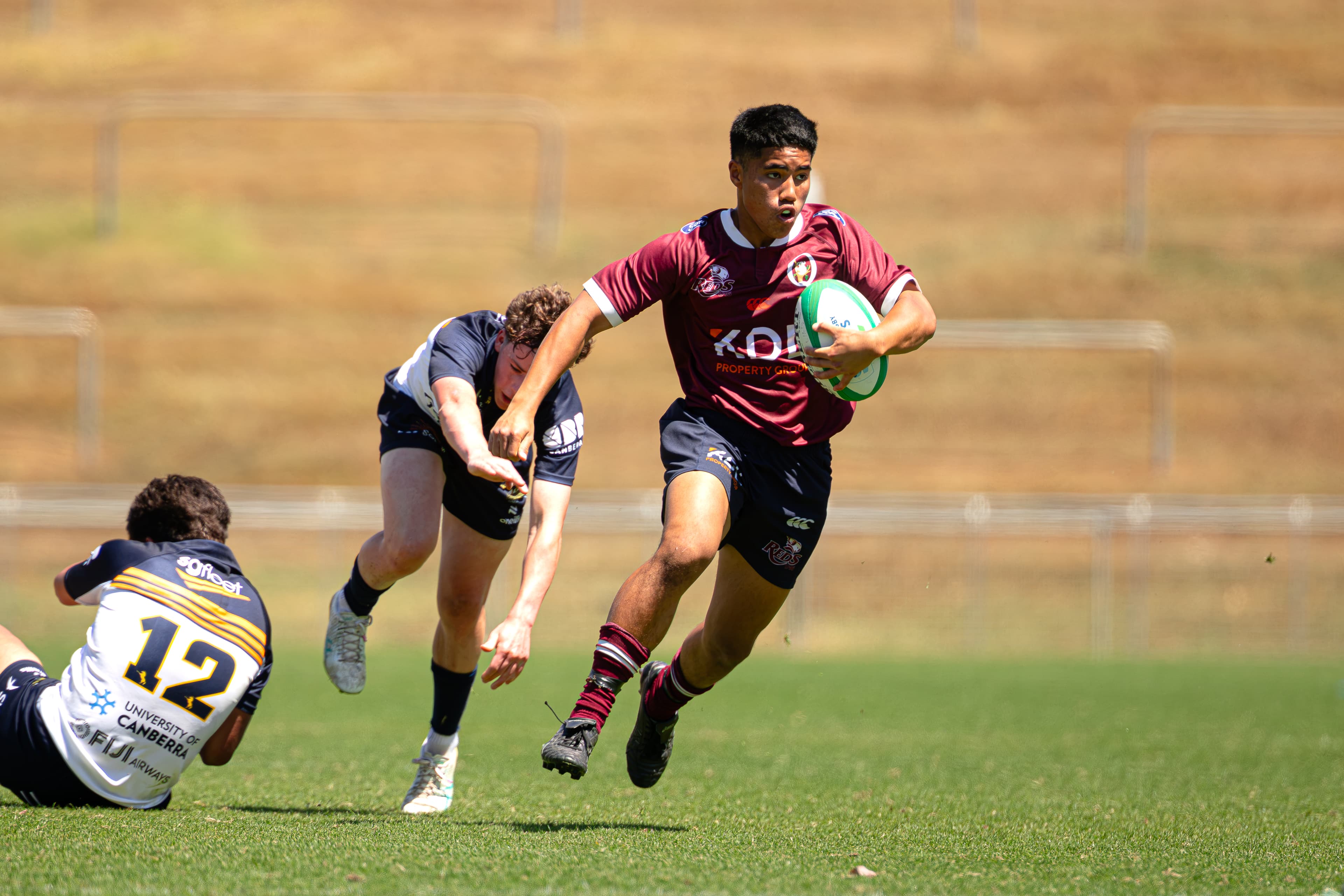Reds U16s flyhalf Raiden Tapuai on the dash at Ballymore