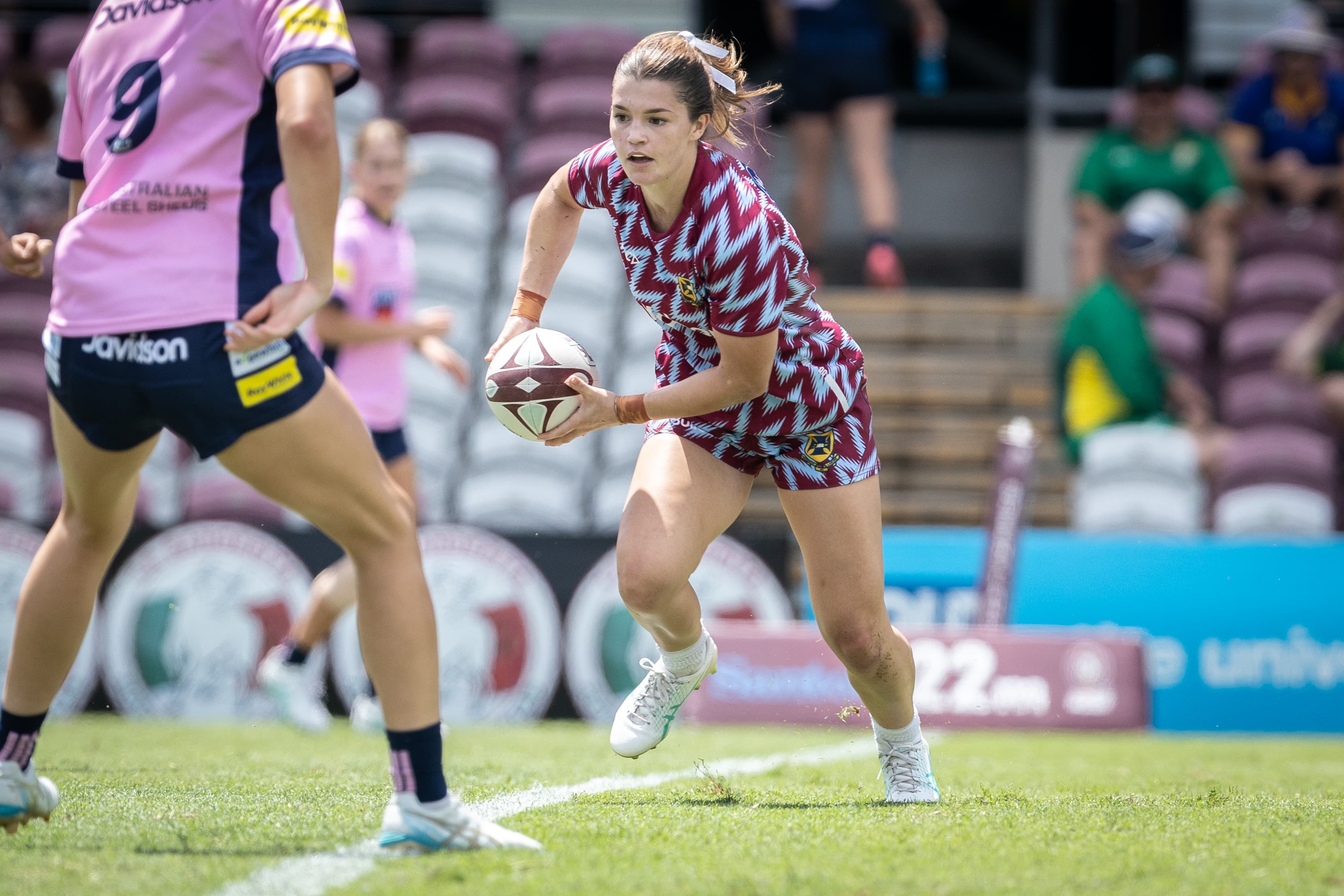 Caitlin Urwin in the distinctive sevens kit of University of Queensland