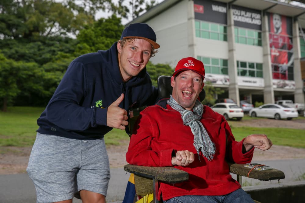 Tom Hamilton shares a laugh with Reds flyhalf Jake McIntyre. Photo: QRU Media/Brendan Hertel