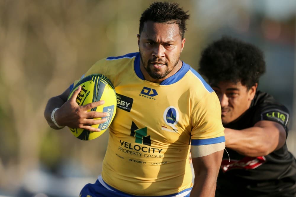 Brisbane winger Sefa Naivalu escapes the clutches of the Eagles defence. Photo: Getty Images 