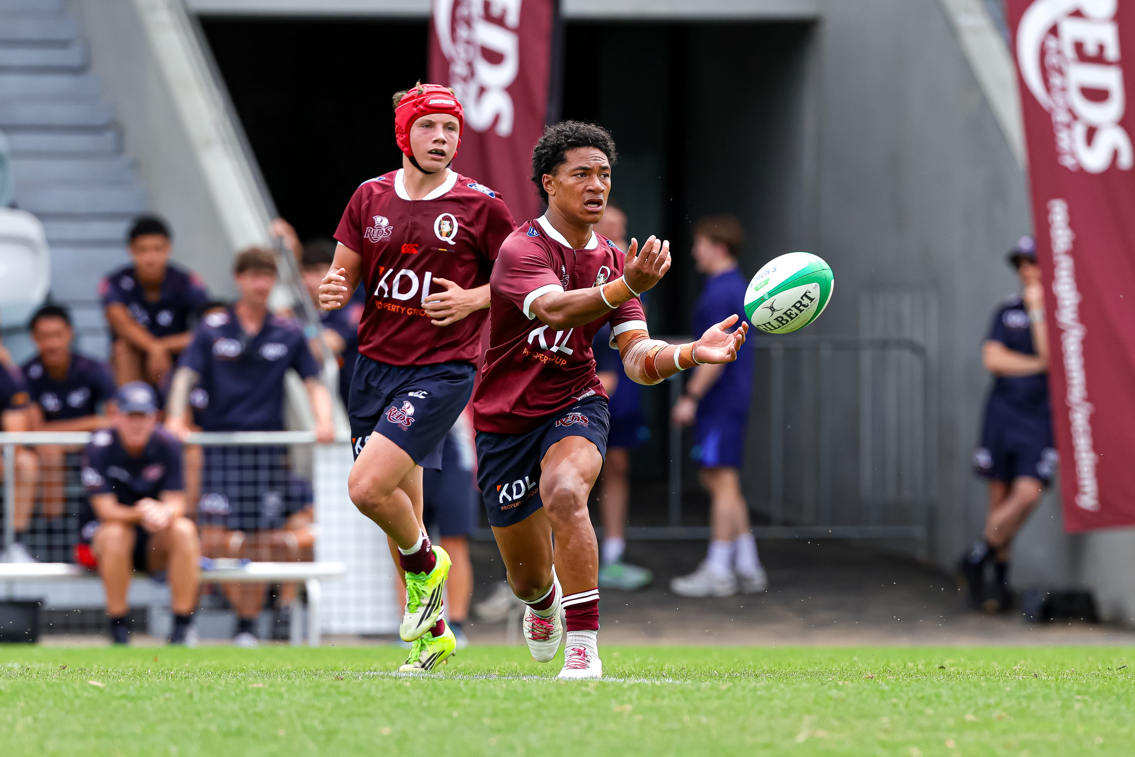 Reds U15s flyhalf Rocky Filikitonga in action today with captain Chase Jackson in support