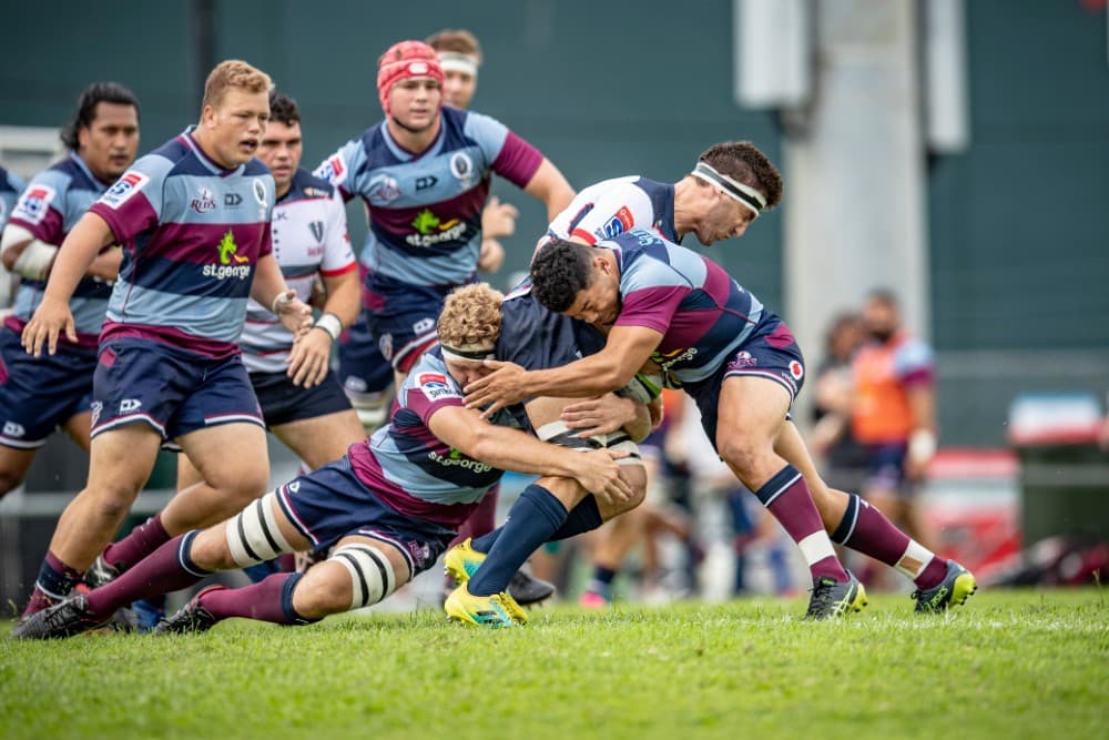 The Reds have been working hard on their tackle technique during the pre-season. Photo: QRU Media/Brendan Hertel