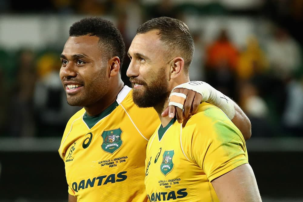 Former Reds and Wallabies teammates Samu Kerevi (left) and Quade Cooper will go head-to-head at Suncorp Stadium on Saturday night. Photo: Getty Images 