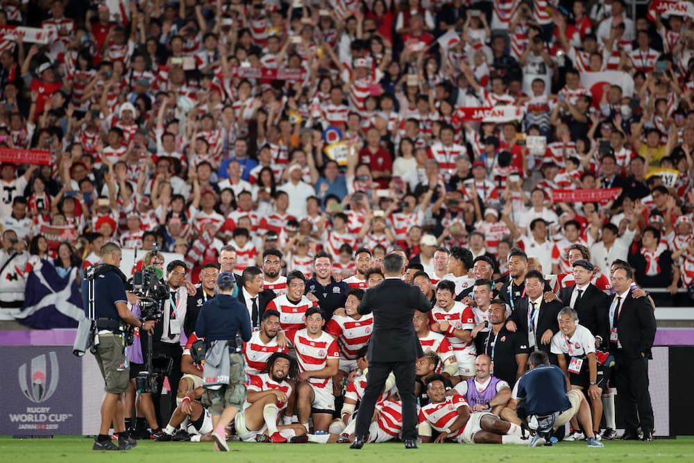 Japan pose for a team photo after their historic win over Scotland. Photo: Getty Images