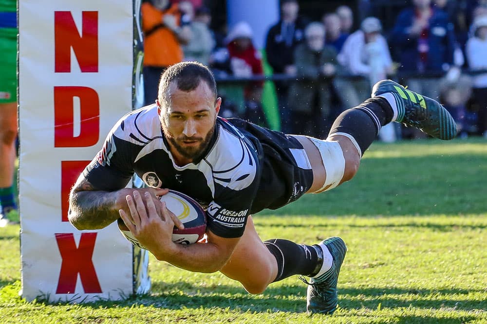 Quade Cooper scores for Souths. Photo: QRU Media Unit/Brendan Hertel