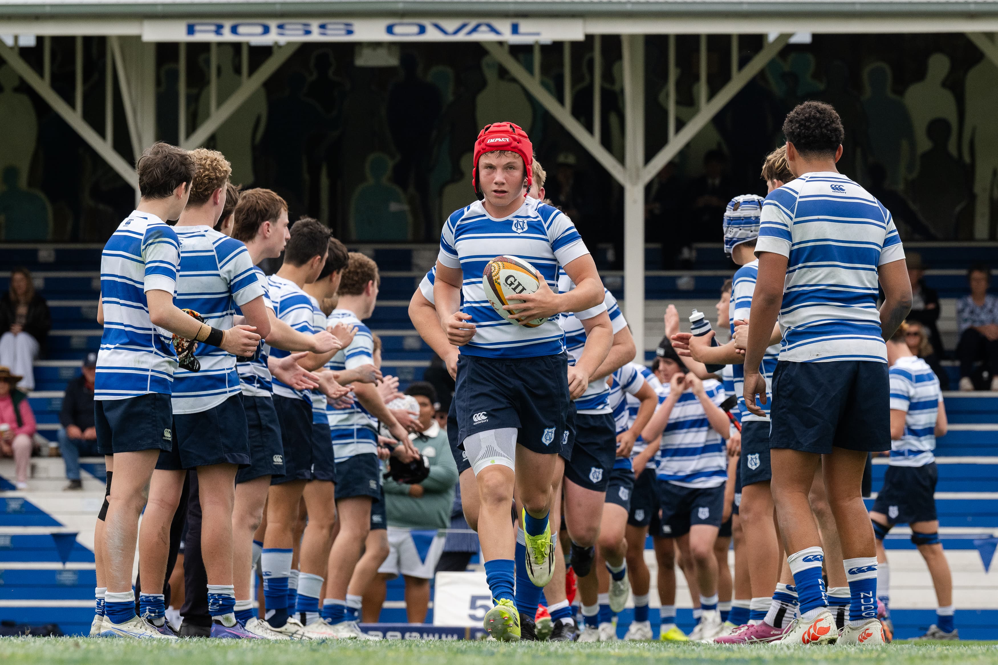 Reds U15s captain Chase Jackson leading out the Nudgee College 15As. Photo courtesy Nudgee College