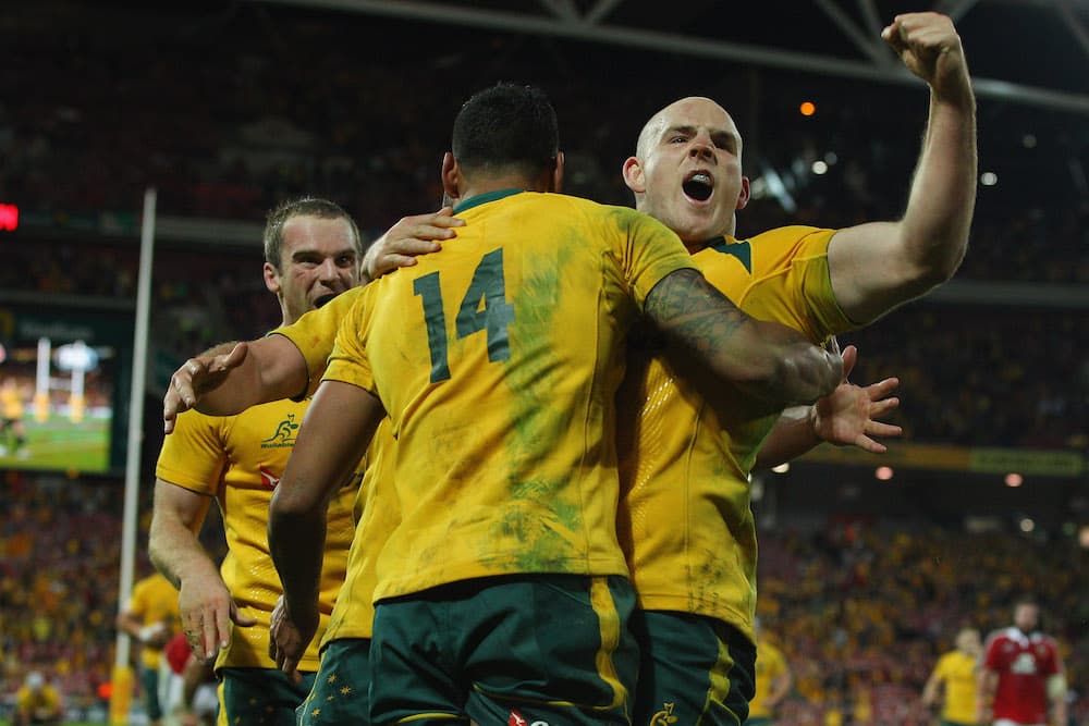 Stephen Moore celebrates with Israel Folau against The British & Irish Lions in 2013. Photo: Getty Images