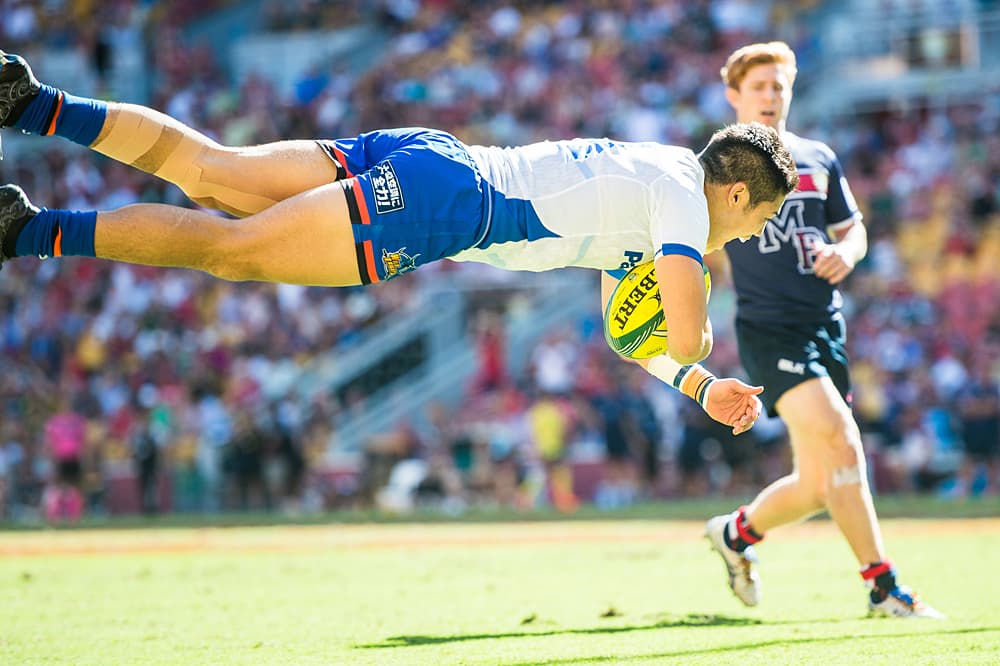 Panasonic’s Yoshikazu Fujita takes the biggest swan dive of the weekend against the Rebels on day one. Photo: Stuart Walmsley/Rugby.com.au