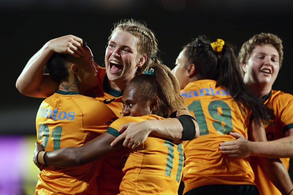 The Wallaroos celebrate a hard-fought win over Wales. Photo: Getty Images