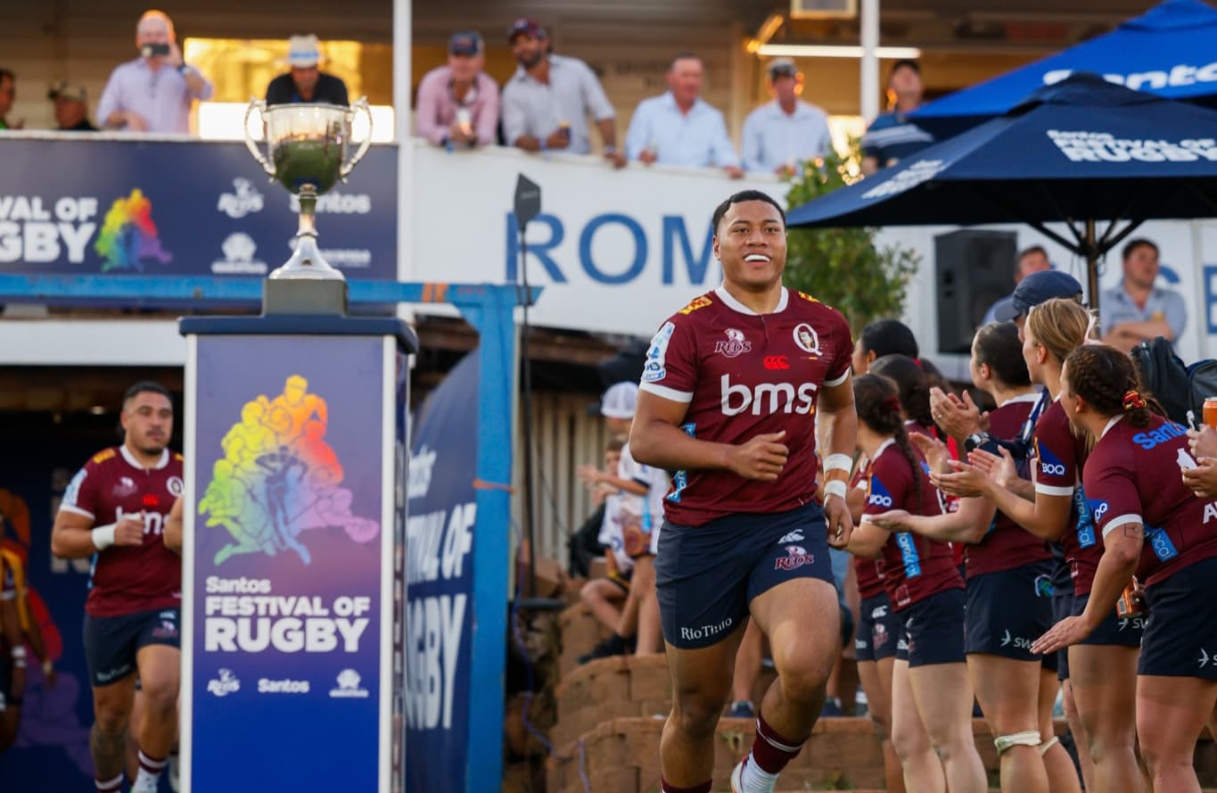 Centre Josh Takai runs out for the Reds in Roma at the Santos Festival of Rugby. Photos: Anthony Wingard