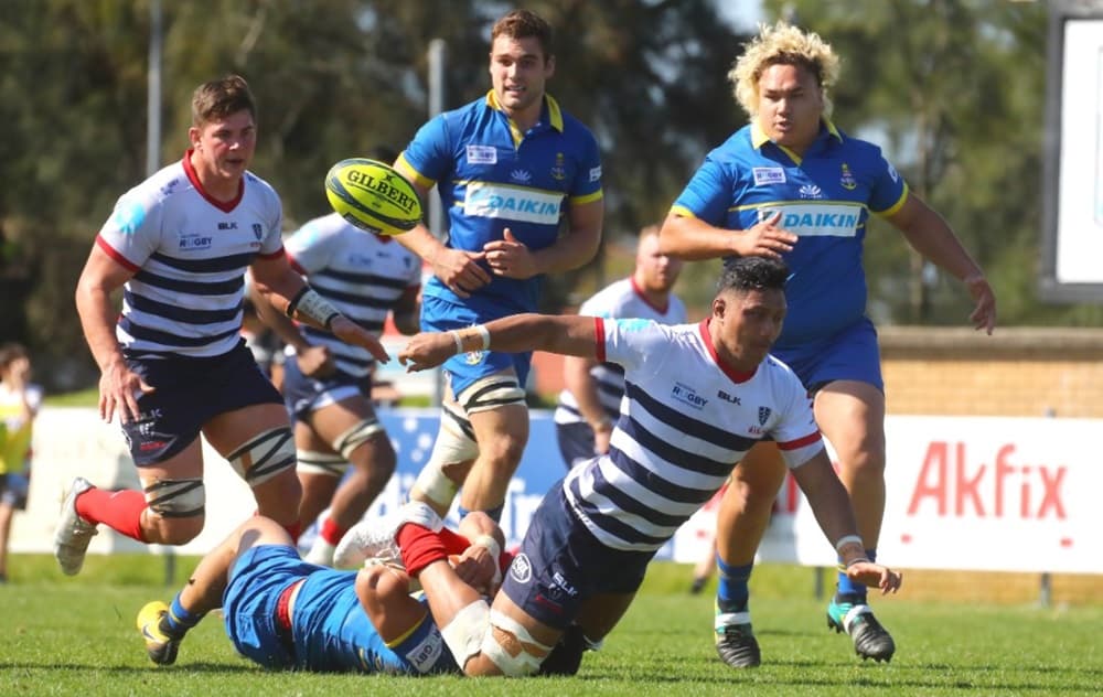 Rob Leota gets an offload that leads to a Rising try against Sydney. Photo: Getty Images 