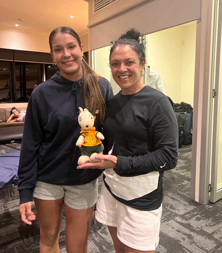 Wallamina, the Wallaroos' toy mascot, in safe keeping or not with Tamika Jones (left) and Iliseva Batibasaga.