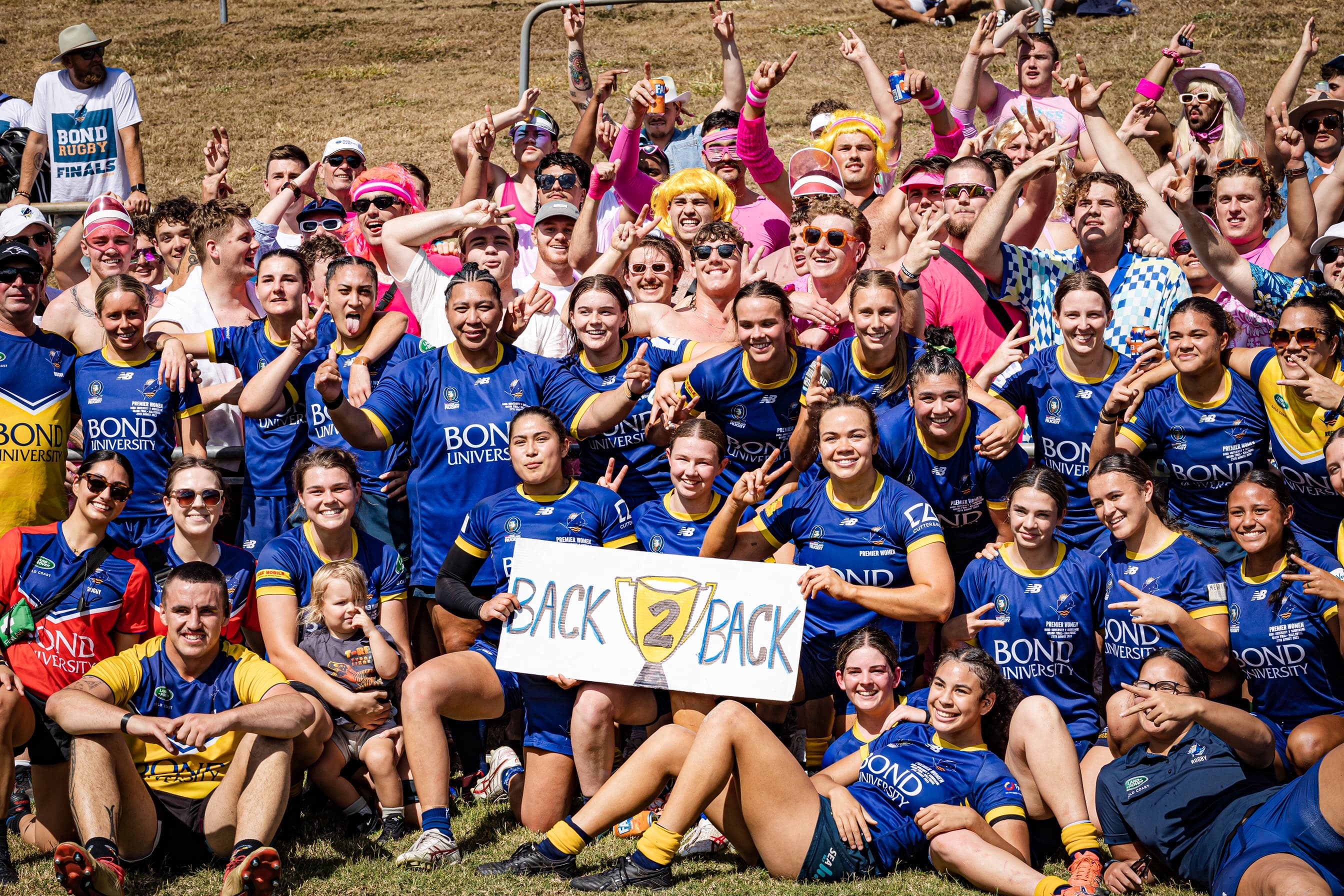 The victorious Bond University woman’s side celebrates at Ballymore. Photo: Brendan Hertel, Rugby Australia