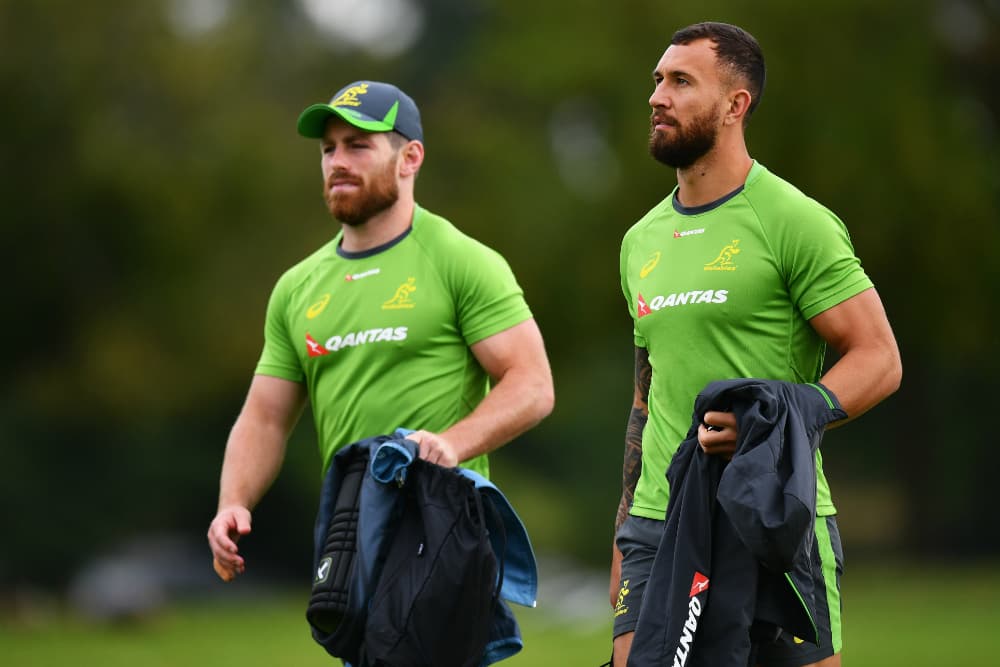 Bernard Foley and Quade Cooper will face off on Saturday night. Photo: Getty Images