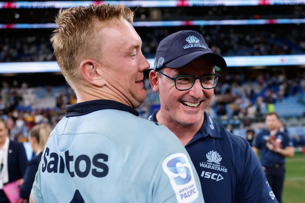 Captain and coach celebrate a win over the Brumbies. Photo: Getty Images