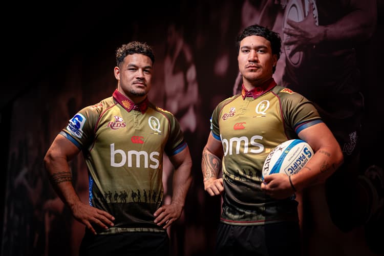 Reds centres Hunter Paisami (left) and Dre Pakeho show off the Reds' Anzac jersey. Photo: Erick Lucero 