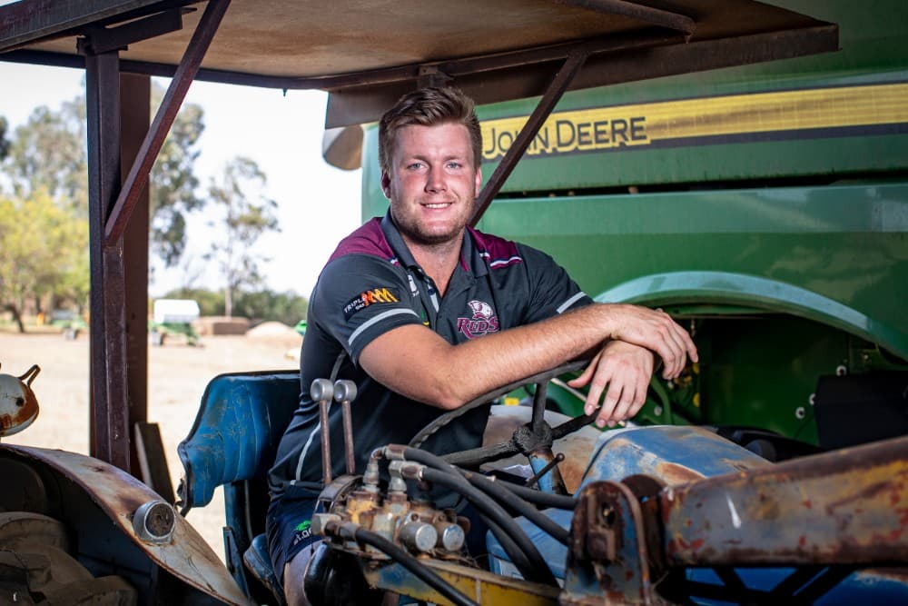 Harry Hoopert on the family farm at Jondaryn, not far from where the Reds will play their final pre-season trial against the Waratahs in Dalby on Friday night. Photo: QRU Media/Brendan Hertel