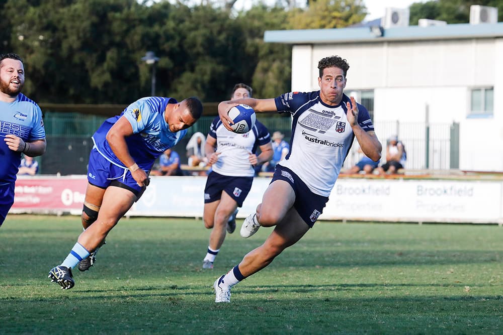 Nawaqanitawase makes a break against the Two Blues in Round One. Photo: Karen Watson