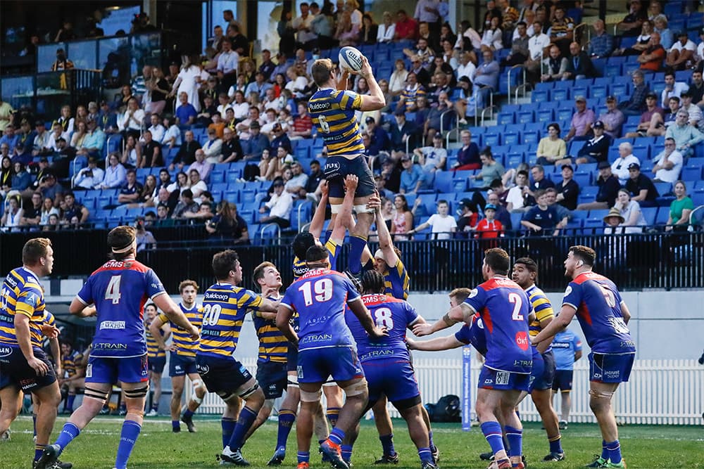 Sydney University contest a lineout against Manly.